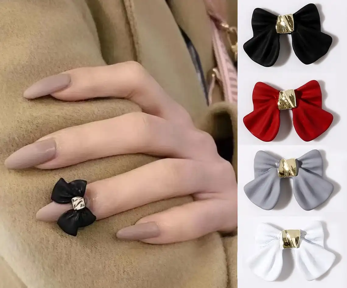 10. Bold Bow Tie Nail Design - wide 2