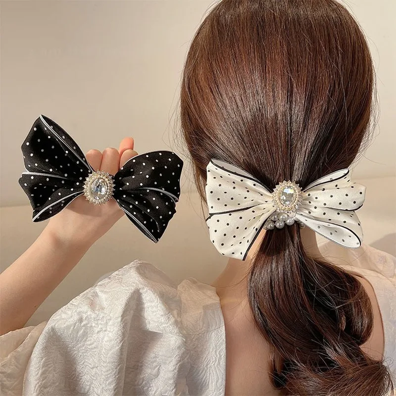 

Dongdaemun, South Korea's new style tied hair summer pearl bow knot little hair rope head rope hair ring headdress low horsetail