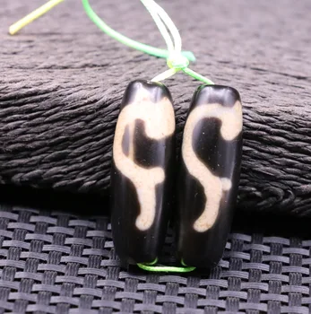

pair of Energy Tibetan Old Agate Ivory Color Ruyi Hook Symbol dZi Bead Amulet