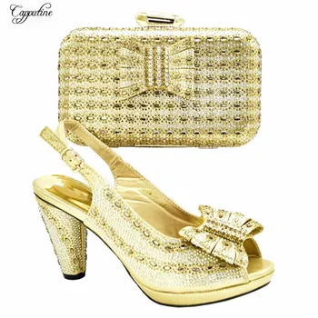 

Popular gold wedding/party African high heel sandal shoes matching with handbag sets with rhinestones 688-19, heel height 10.5cm