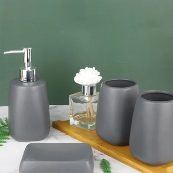 

Ceramic Set for Bathroom 4pcs Bathroom Accessories Storage Include Lotion Dispenser Soap Dish Toothbrushes and Toothpaste Holder