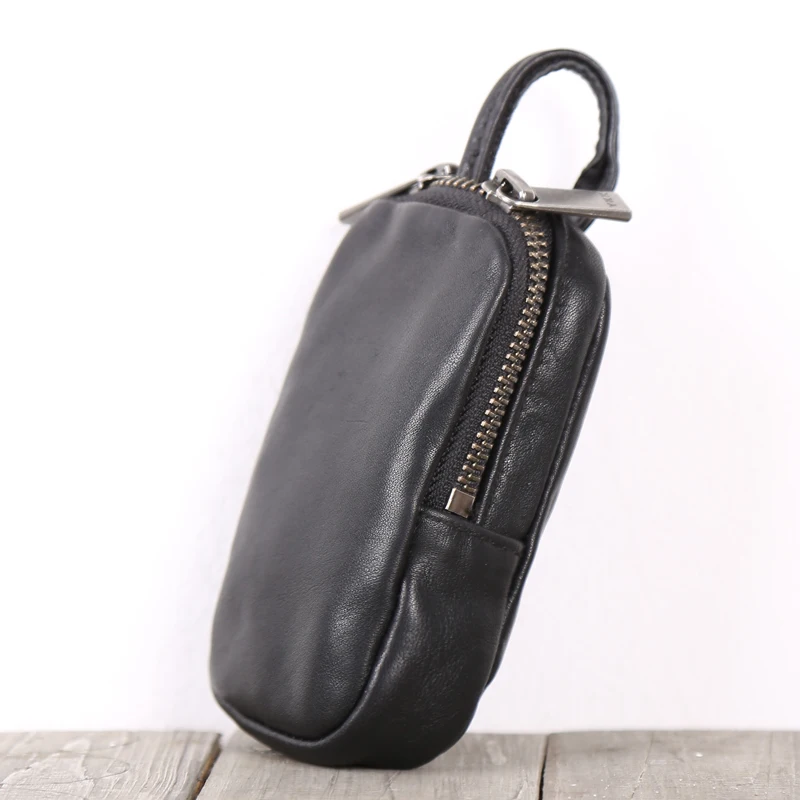 

2020 new Leather manual key bag car key receive bag cowhide zero wallet card bag hand carry bag