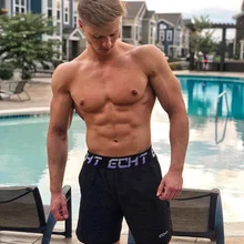 Новые мужские тренажерные залы, мужские шорты для фитнеса, летние быстросохнущие повседневные короткие мужские брюки с вышивкой, штаны для бега и тренировок, пляжные длиной до колен