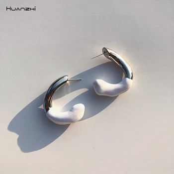 

HUANZHI 2020 Punk White Dripping Glaze Sliver Plated Metal Geometric Irregular C-shaped Stud Earrings for Women Girls Jewelry