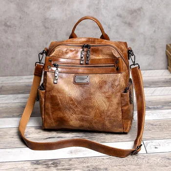 

Autumn and winter new splicing oil wax leather single shoulder Handbag women and men bag school bags Retro bag fashion