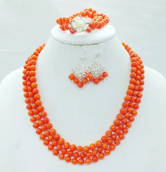 

Classic 7MM coral. 3 layers, coral necklace. Bracelet. Earrings. African bride wedding necklace set