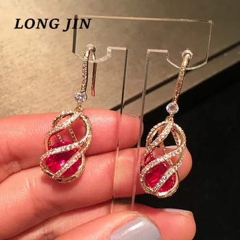 

Korean Version Of The Geometric Golden Hollow Flower Pendant Colored Zircon Earrings Women's Long Face Thin Pendant Earring