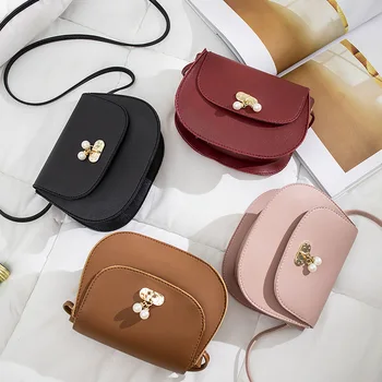 

Solid Color Versatile Luxury Pearl Bracelet Charm Saddle Bags Women's New PU Handbags Simple Shoulder Bag Crossbody Bags Female