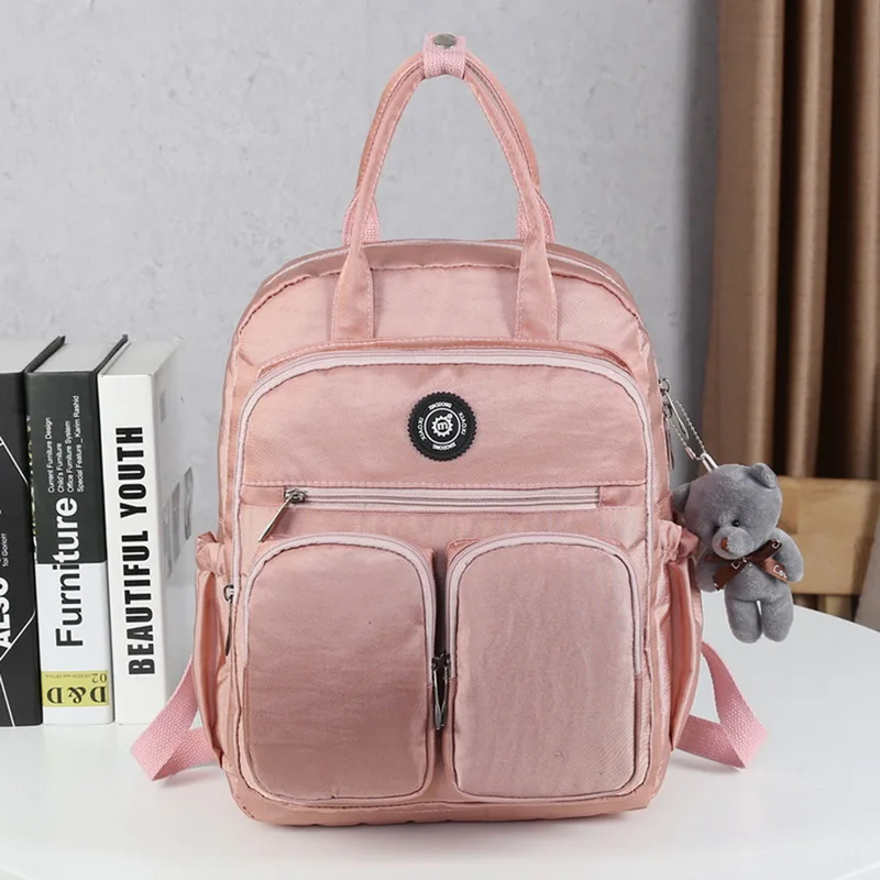 

JODIMITTY Woman Backpack Waterproof Nylon Soft Handle Solid Multi-pocket Travel Zipper Mochila Feminina Sac A Dos School Bags