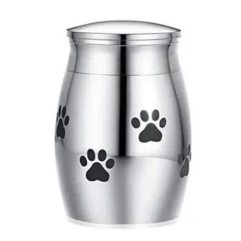 

A stainless steel tree of life urn commemorating a dog and cat urn