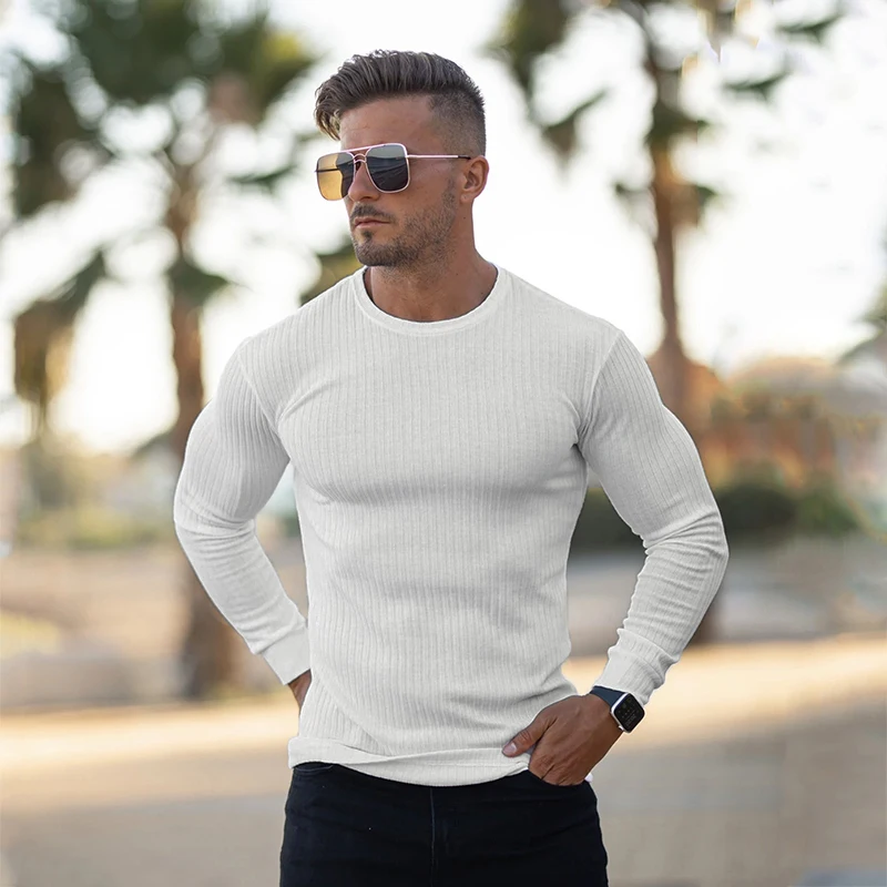 Suéteres finos de moda para hombre, jerseys informales de manga larga con cuello redondo, suéteres en forma de sólido, Tops tejidos, novedad de otoño