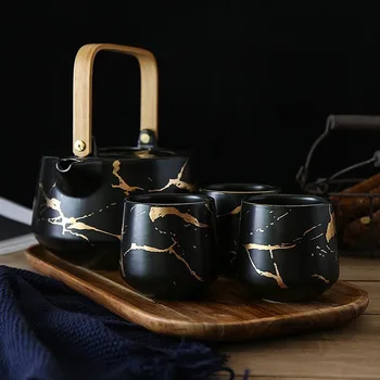 

Nordic Style Teapot Set Creative Matte Handmade Ceramic Art Ins Tea Set Golden Marble Kettles 1 Pot 4 Cups with Wooden Trays