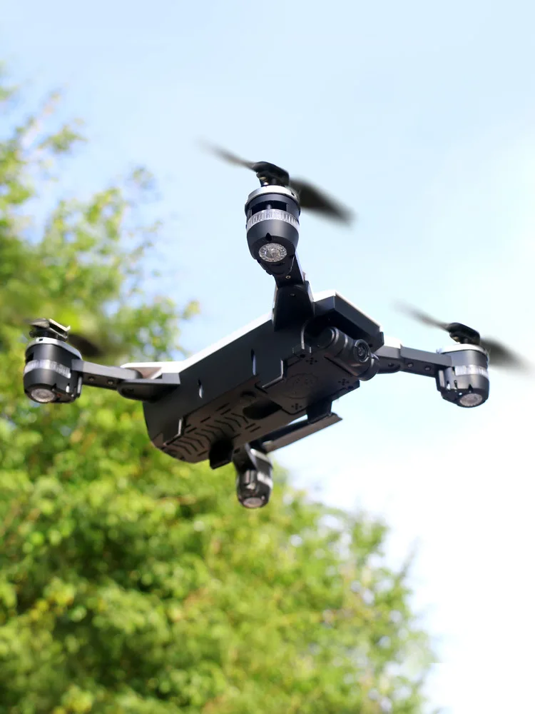 

Helicopter Drone for Aerial Photography High-definition Profession Remote Control Aircraft Quadcopter Folding Rechargeable Drop-