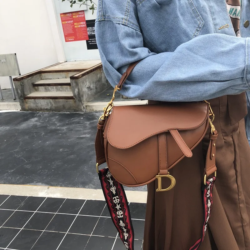 

Creative saddle bag women's bag 2019 spring and summer new wide Kiplingd shoulder strap portable shoulder bag handbag