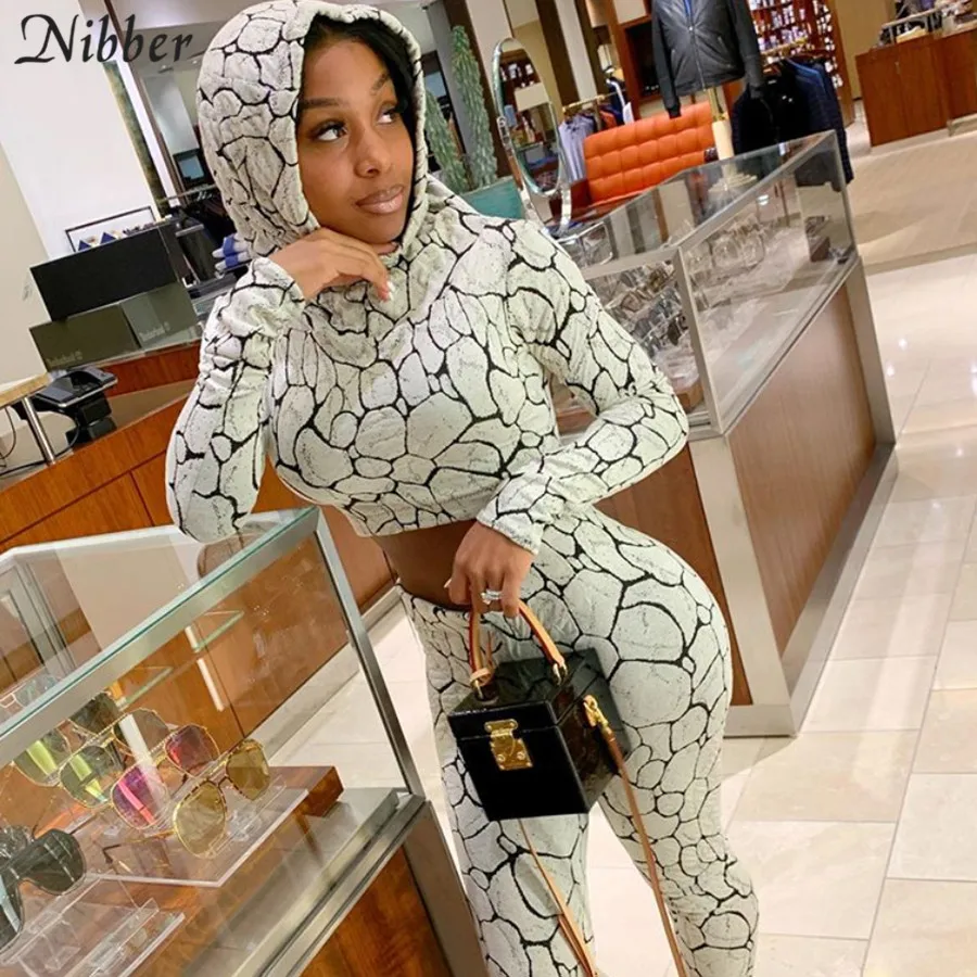 

NIBBER 2020 spring autumn casual sports fitness stripe women suit Hooded top and pants 2 pieces set fashion simple skinny style