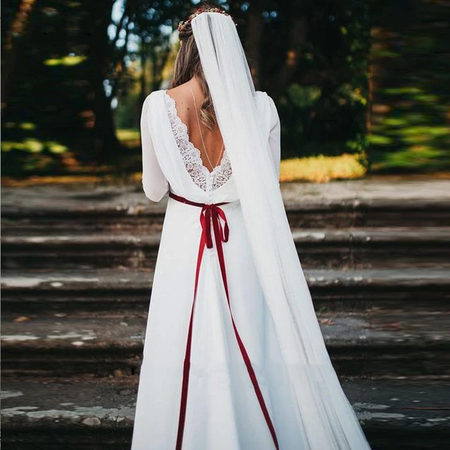 White lace wedding gown with apple red corset lace ups | Wedding gowns  lace, Making a wedding dress, Red wedding dresses