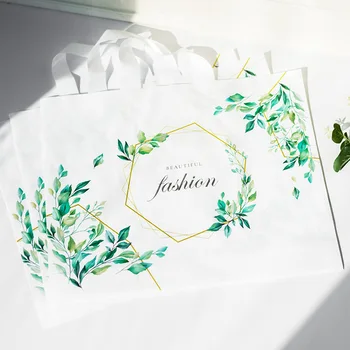 

50pcs Thick Large Plastic Bags With Handle Beautiful green leaves Fashion clothing store Packaging Bags Wedding candy Gift Bag