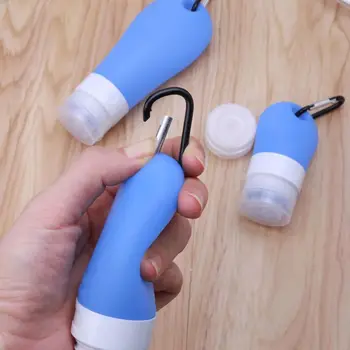 

Portable Silicone Refillable Containers Squeezable Reusable Hand Sanitizer Empty Travel Bottles with Keychain Carriers