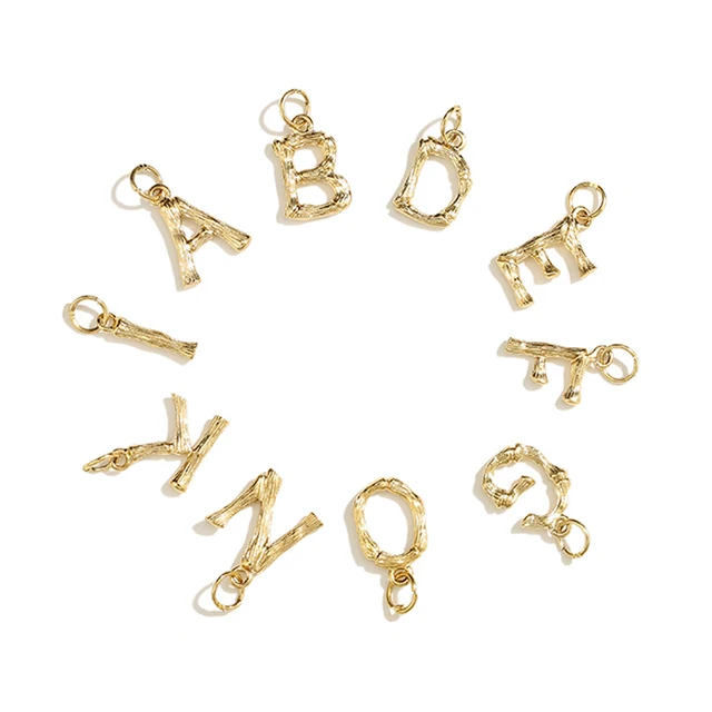 Create personalized necklaces and bracelets with eManco Initial Charms