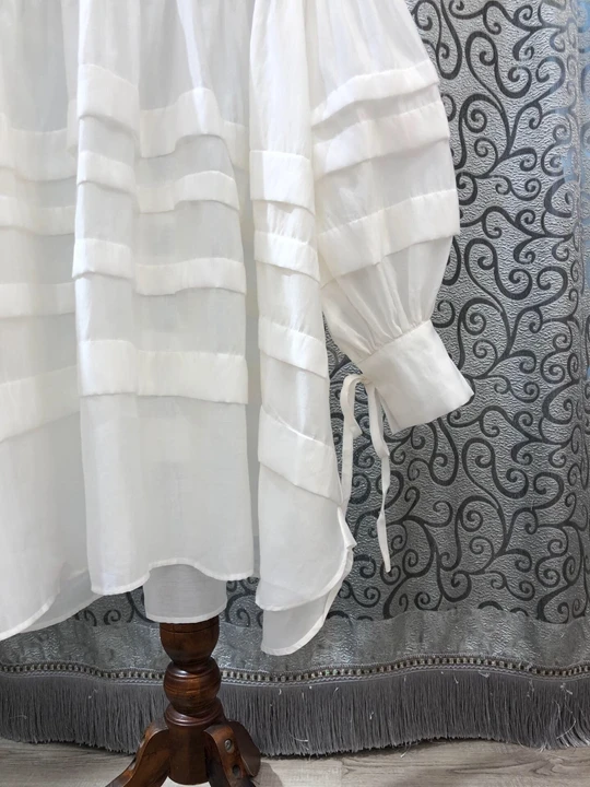 Early Autumn New Women's Wear Xiaoli Leader's Loose Long Sleeve Dress with Pure Colour Decoration