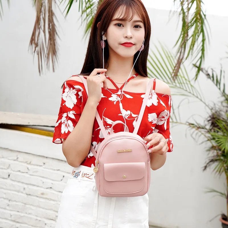 

Korean version of the summer new fashion handbag shoulder small backpack small bag convenient magnetic buckle front pocket