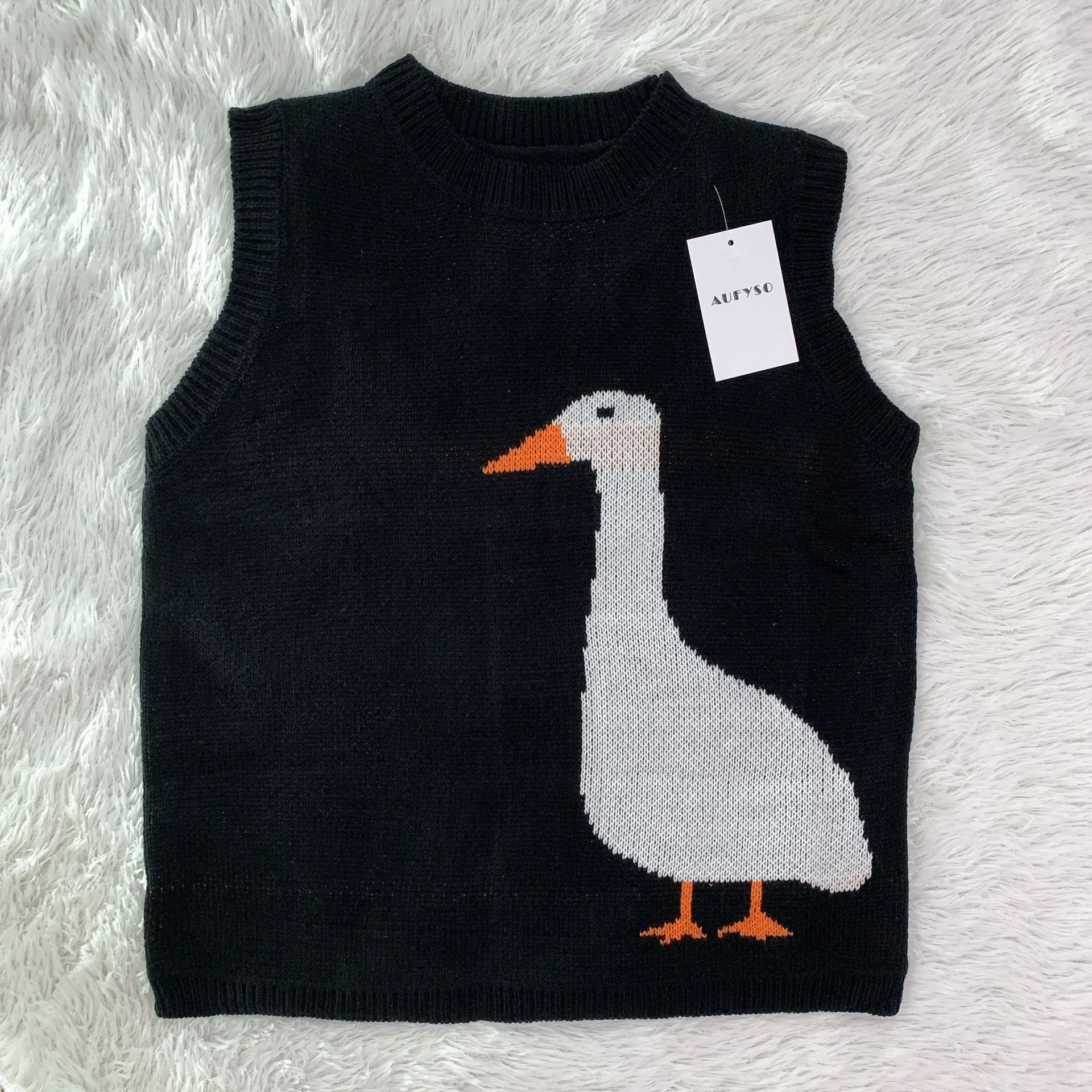 goose sweater vest