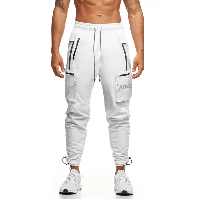 

2020 Autumn and winter new Jogging Men Sweatpants Sport Running Pants Male Joggers Cotton Slim Fit Pants Bodybuilding Trousers