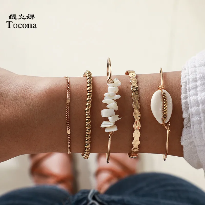 

Tocona 5pcs/sets Gold Beaded Bracelets White Natural Stone Bohemian Beach Shell Open Brangles for Women Summer Jewelry 8569