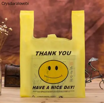 

4 sizes 50pcs Supermarket Lovely Smile yellow pink Vest Plastic Carrier Shopping bag with handle plastic Hand Bag Packaging Bag