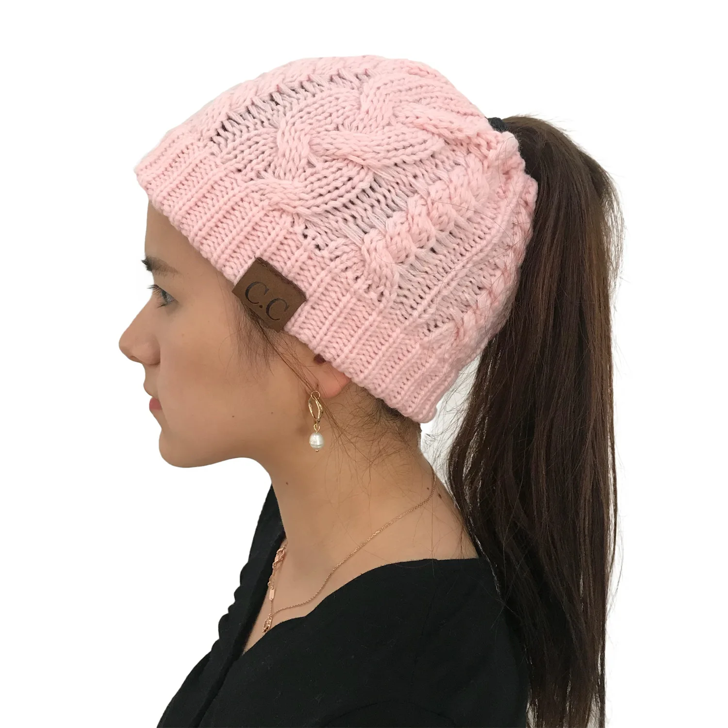 European and American autumn and winter hats pop-up twist knitted ponytail hat lady's woolen hat