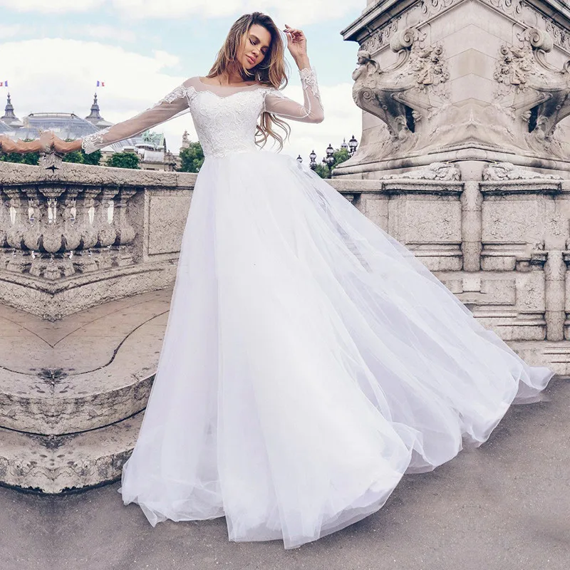 

Sheer Scoop Long Sleeves Lace Appliques Wedding Dresses Tulle Skirt Buttons Back Wedding Gown For Ladies Spring Bride Wear