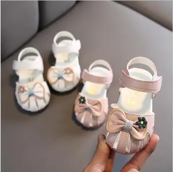 

2020 summer new Korean baby Baotou soft bottom sandals bow knot female baby 0-2 years old walking sandals