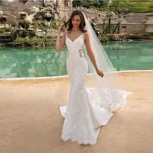 

Sexy Lace Appliques Tulle Mermaid Wedding Dress Princess V-Neck Spaghetti Straps Illusion Backless With Button Bridal Gown 2022