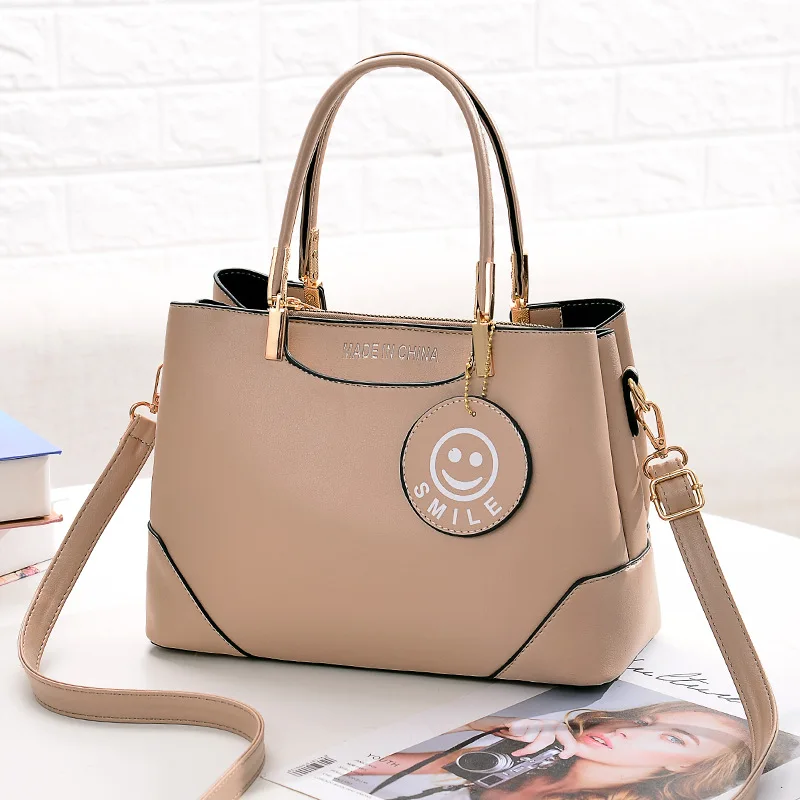 

2020 New Style WOMEN'S Bag Bag Solid Color Simple Handbag Elegant Mommy Bag Smiley Decoration Crossbody Bag