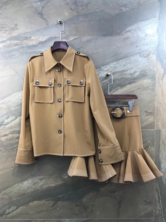 

2019 Early Autumn New Female Turn-over Collar Symmetrical Pocket Long Sleeve Button Top + Lotus Leaf Edge Half Skirt Suit 904