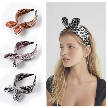 

DUOJIAOYAN Lasted Leopard knotted headband For women girls Wide-brimmed fabric cross rabbit ears headpiece Fashion bow headband