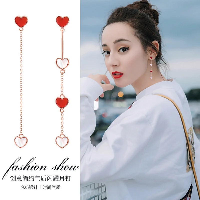 

Silver needle asymmetric love show thin earring net red tide personality atmosphere red super fairy girl heart drop oil ear nail