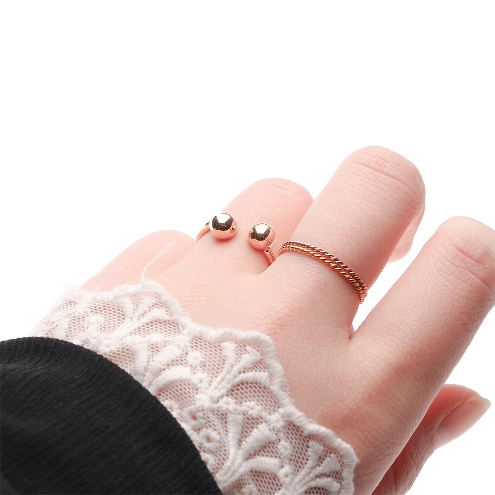 Bijoux pour femmes géométriques simples réglables en or et argent avec deux anneaux en os ouverts et perles de style mode 2025_voghion.com