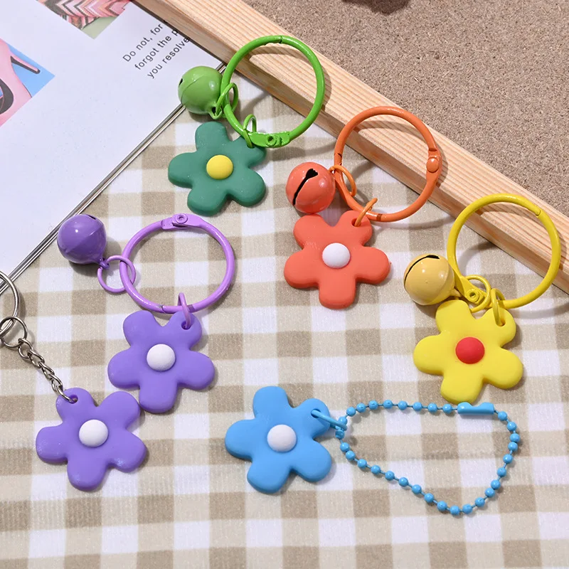 

Wear Small Bell Key Chain with A Bag Pendant. Small and Colorful Flowers 4pcs