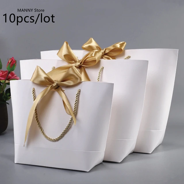 Paquete de 16 bolsas de regalo de cumpleaños de 50 años, ideales para  regalos de fiesta, bolsas negras y doradas, bolsas de papel para dulces con  asas