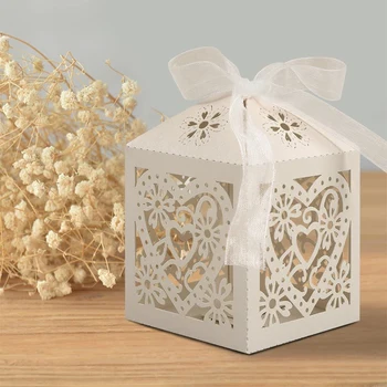 

10Pcs/lot 2020 New Love Heart Laser Cut Hollow Carriage Favors Gifts Candy Boxes With Ribbon Baby Shower Wedding Party Supplies