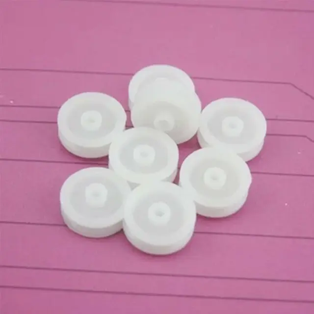 white plastic pulley wheel