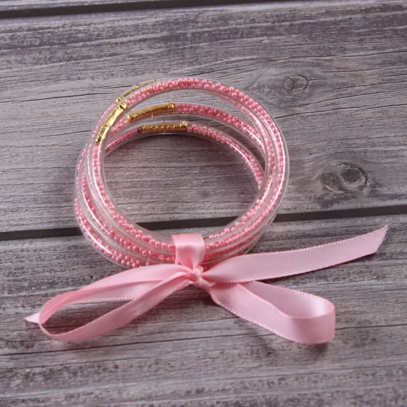 

5PCS/Set Glitter Filled Stack Silicone Circles Bangle Set Women Bowknot Beads Jelly Bangles Bracelet