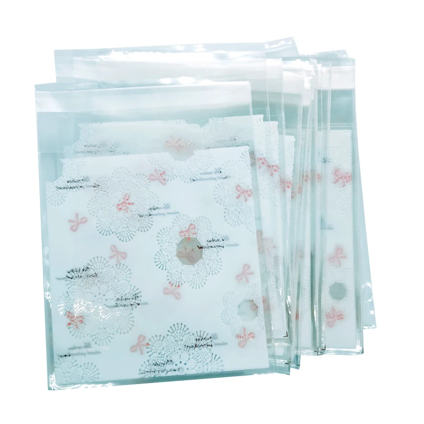 

100pcs/lot 10X10cm Pink Bow snowflake Cookie packaging candy color self-adhesive plastic bags for biscuits snack baking package