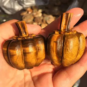 

1pcs Beautiful crystal carving natural quartz yellow tiger eye stone hand-carved Halloween pumpkin.It's shiny.Halloween gifts