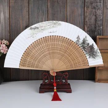 

New Chinese elegant solid wood printed rice paper fan is simple, elegant and unpretentious paper hand fan folding hand fans