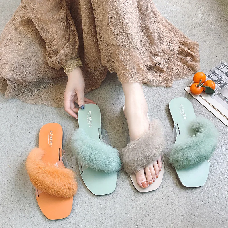 

Cross fur slippers female 2019 new Korean version of the summer flat transparent word drag wild wear sandals
