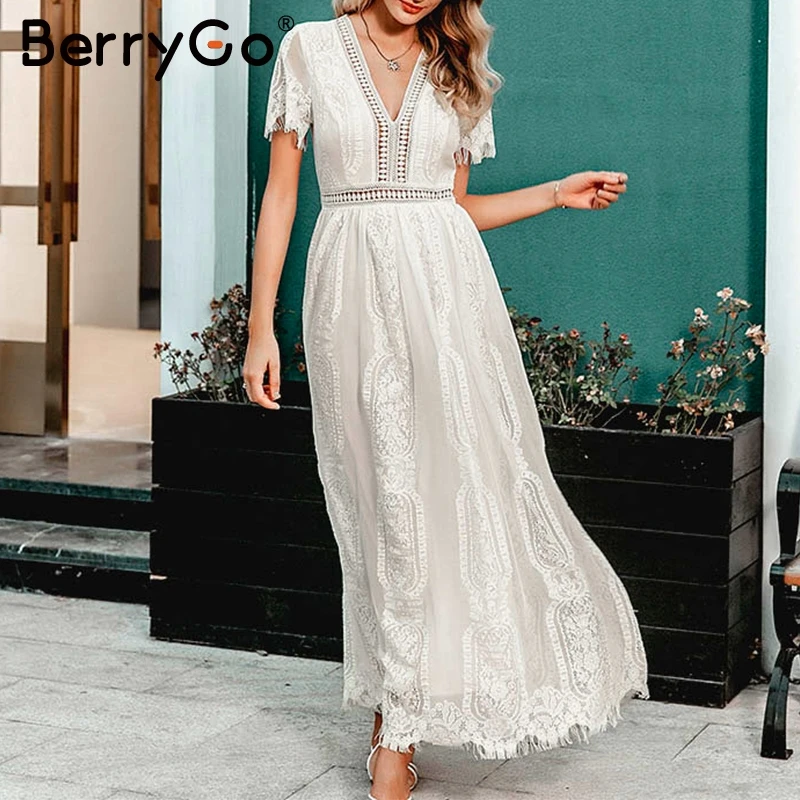 

BerryGo Sexy v-neck white maxi dress women Chic A-line autumn short sleeve lace dress Elegant hollow out evening party dress