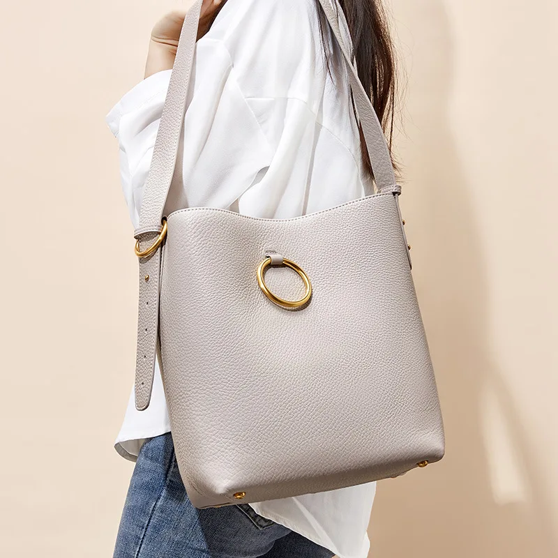 

Litchi pattern small crowd design bucket ladies Baotou cowhide new fashion Baitie one shoulder oblique Bag summer