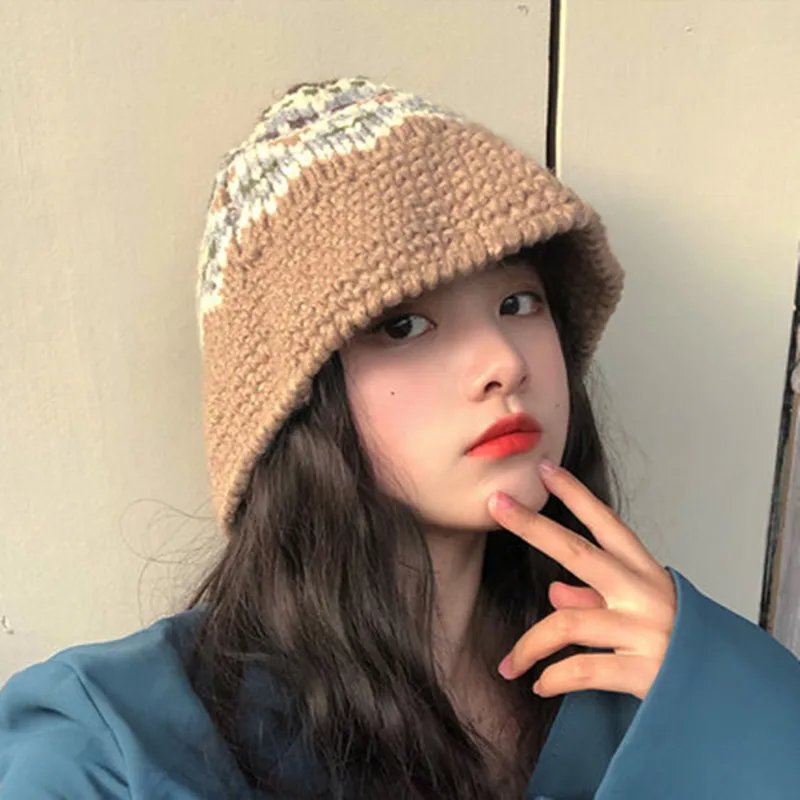 

Hand-knitted wool fisherman's cap and woman's Street cap in autumn and winter